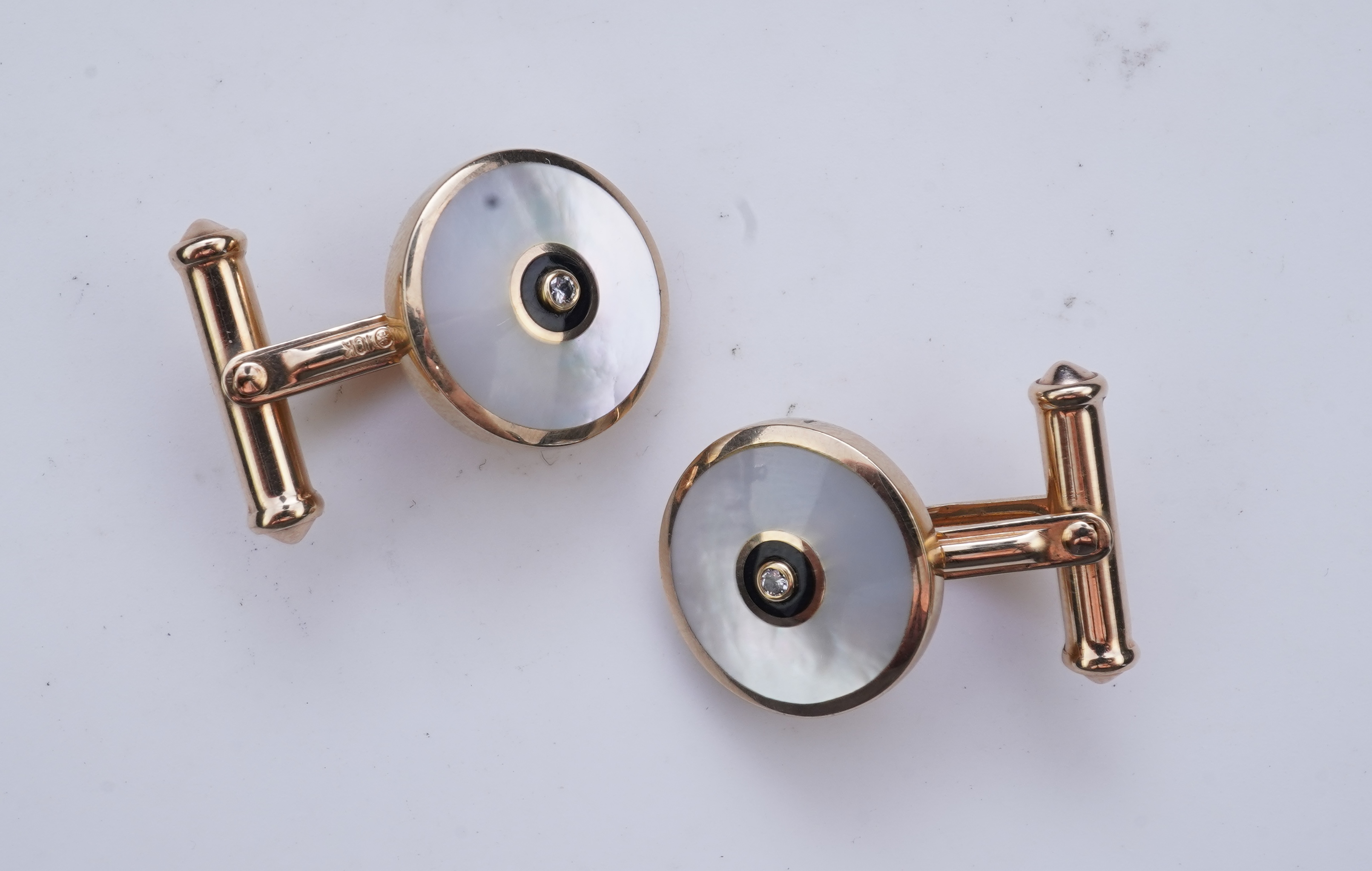 A mother of pearl and diamond dress set